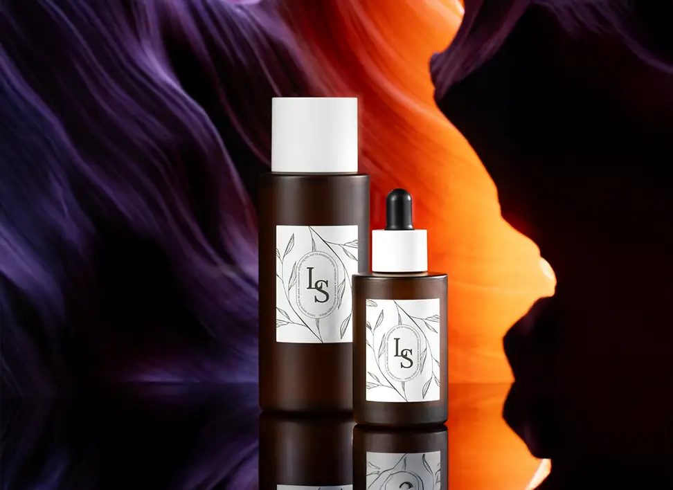 Two perfume bottles featuring custom branded labels showcasing personalized fragrance creation process